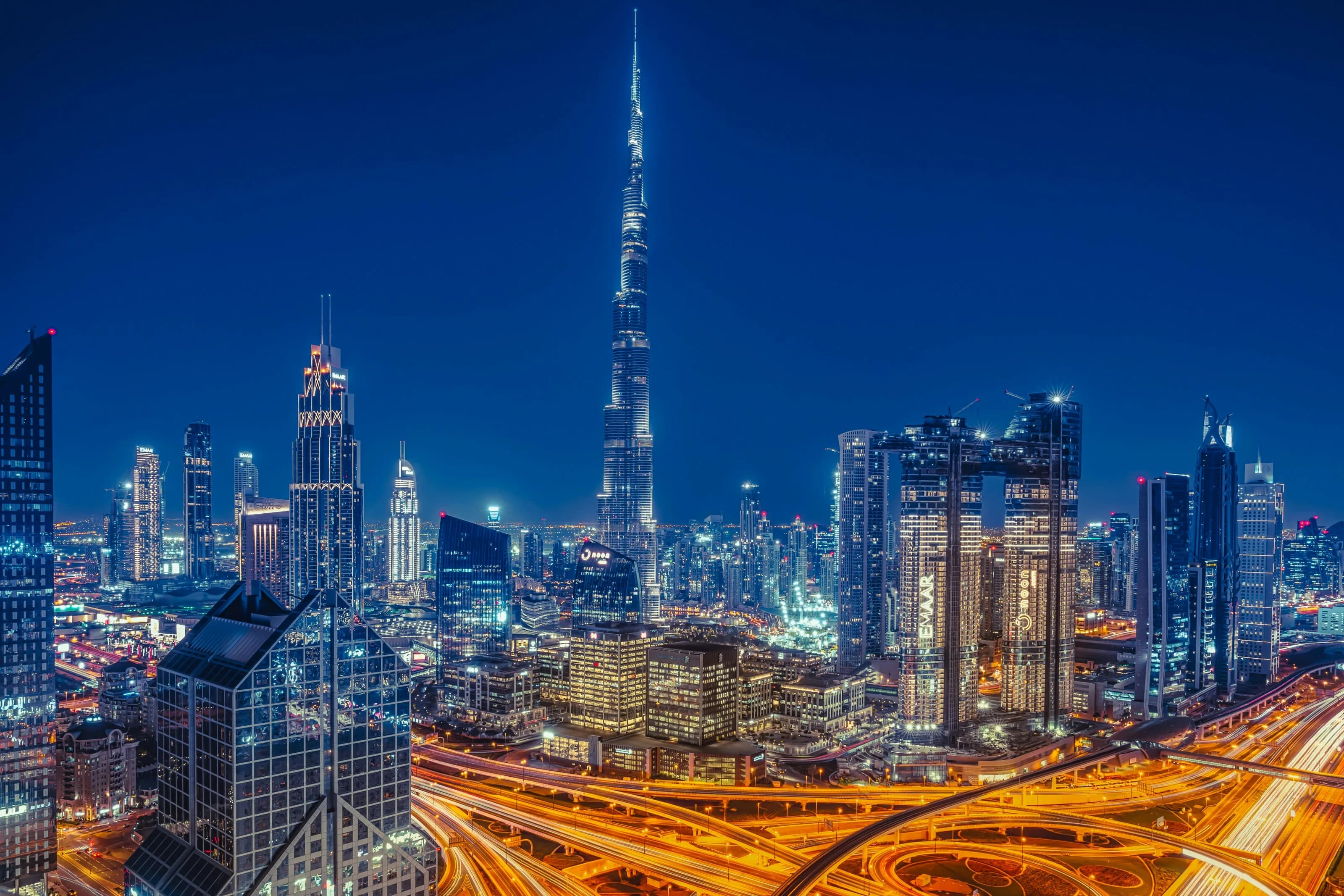 Sunset view of Dubai Downtown featuring Burj Khalifa